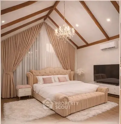 Luxurious bedroom with vaulted ceiling, elegant chandelier, and plush furnishings.