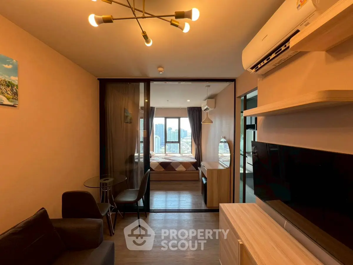 Modern apartment interior with cozy living room and stylish bedroom view.