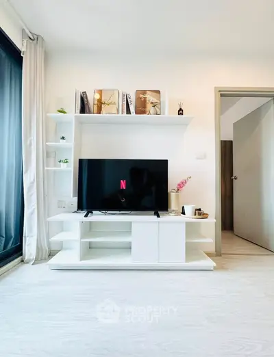 Modern living room with sleek TV stand and minimalist decor