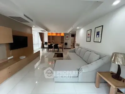 Spacious modern living room with elegant decor and large sectional sofa