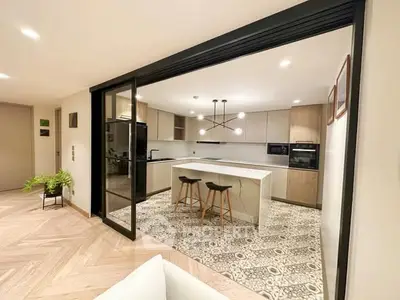 Modern kitchen with open layout and stylish island seating
