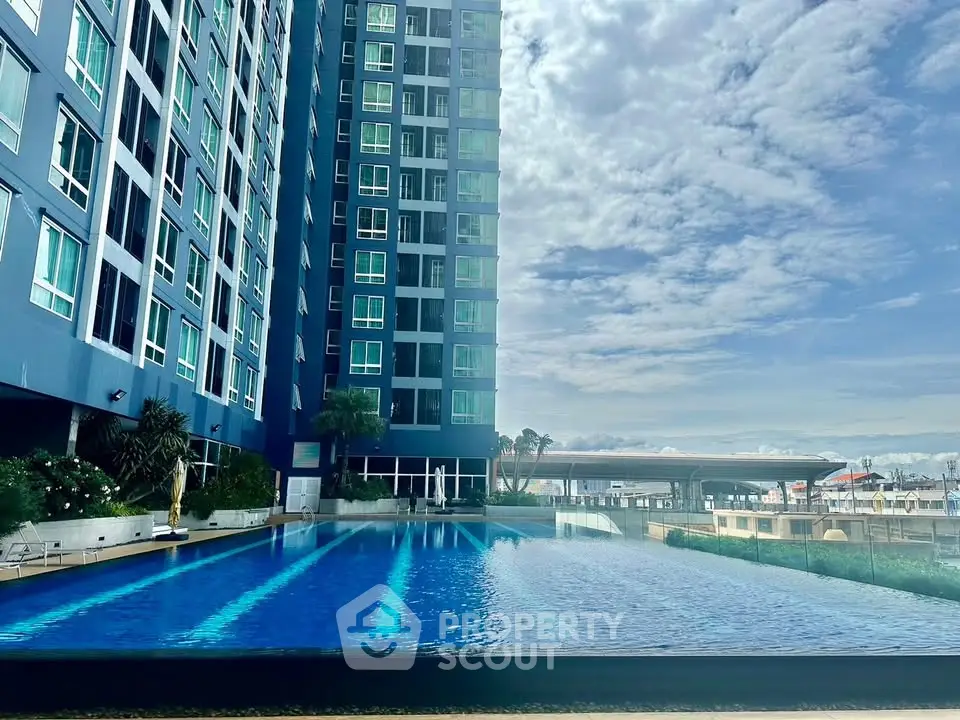 Luxurious high-rise building with stunning pool and panoramic views