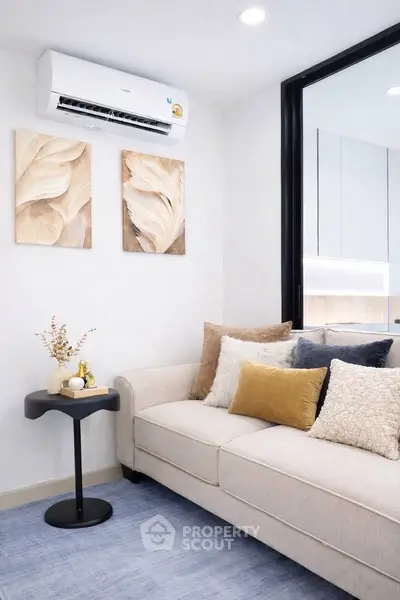 Cozy living room with modern decor and air conditioning