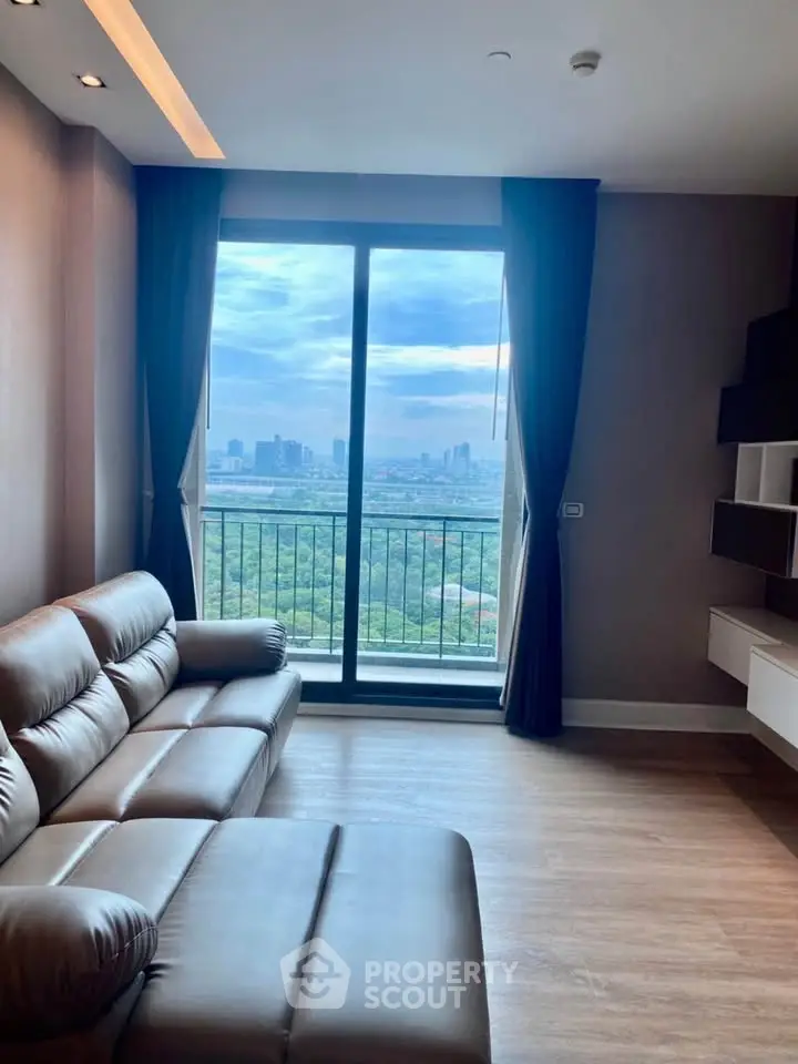 Luxurious living room with stunning city view and elegant leather sofa