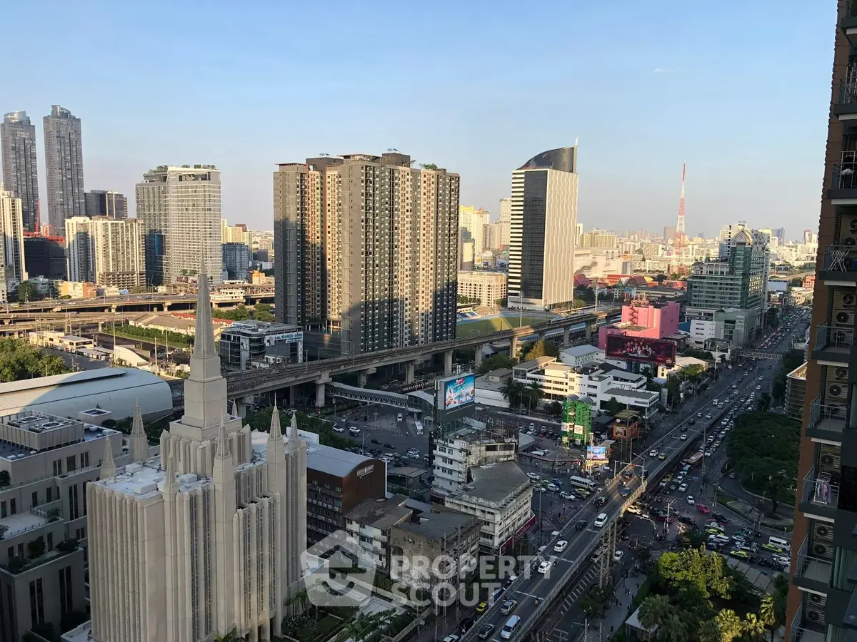 Stunning cityscape view showcasing modern high-rise buildings and bustling urban streets.
