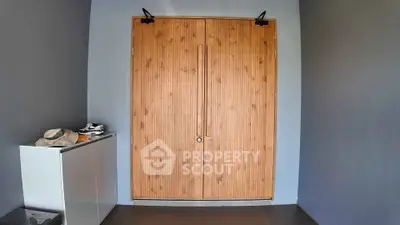 Modern wooden entrance door with sleek design and minimalist decor