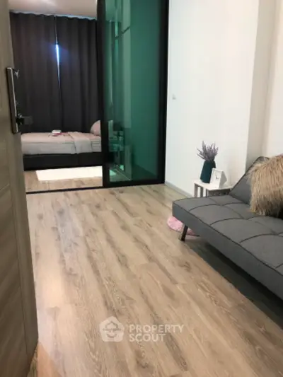 Modern apartment interior with stylish bedroom and cozy living area