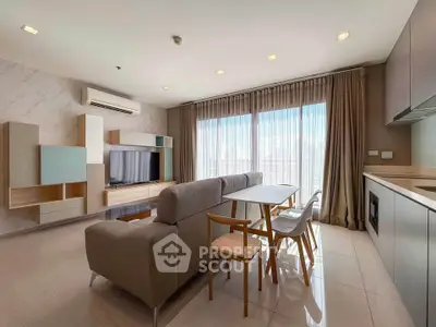 Modern living room with stylish furniture and large windows offering a stunning city view.