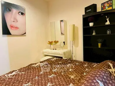 Cozy bedroom with designer bedding and stylish decor, perfect for modern living.