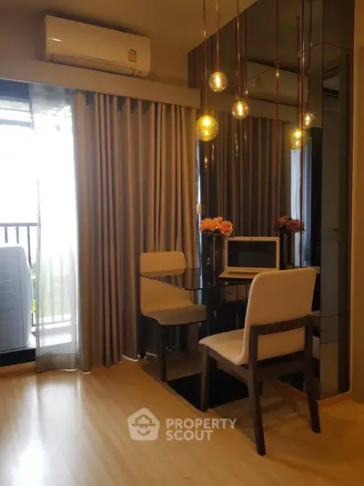Modern study area with elegant lighting and balcony view