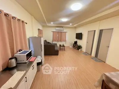 Spacious living room with modern furniture and natural light