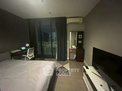 Modern bedroom with balcony view, featuring sleek furniture and ambient lighting for a cozy urban living experience.
