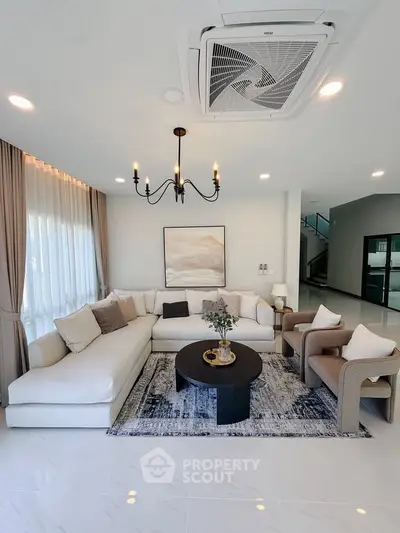Luxurious modern living room with elegant decor and spacious seating area