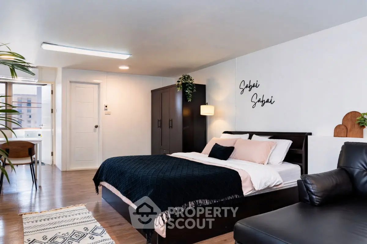 Modern bedroom with stylish decor and cozy ambiance