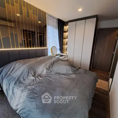 Luxurious modern bedroom with stylish decor and ample storage space