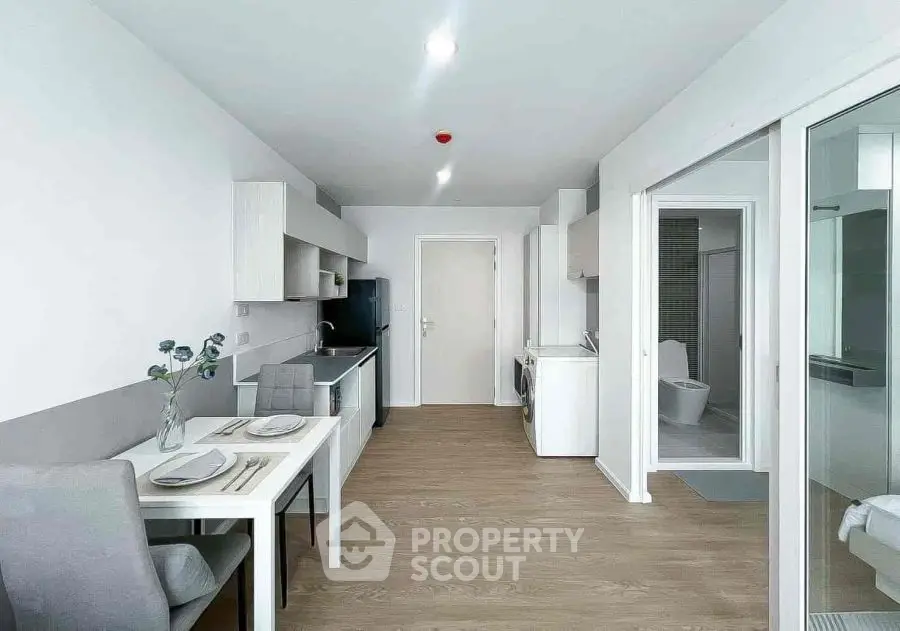 Modern kitchen with sleek design and integrated appliances