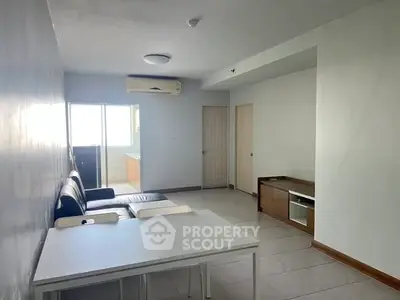 Spacious living room with modern furniture and natural light