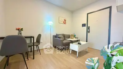 Modern living room with stylish decor and cozy seating area, perfect for relaxation and entertaining.