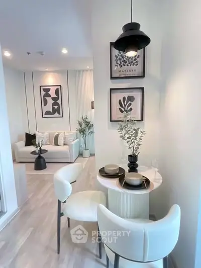 Modern living room with stylish decor and cozy dining area