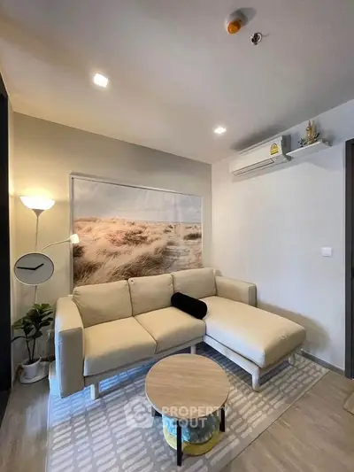 Modern living room with cozy beige sofa and stylish decor