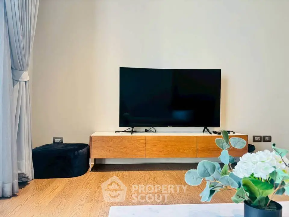 Modern living room with sleek TV setup and elegant decor