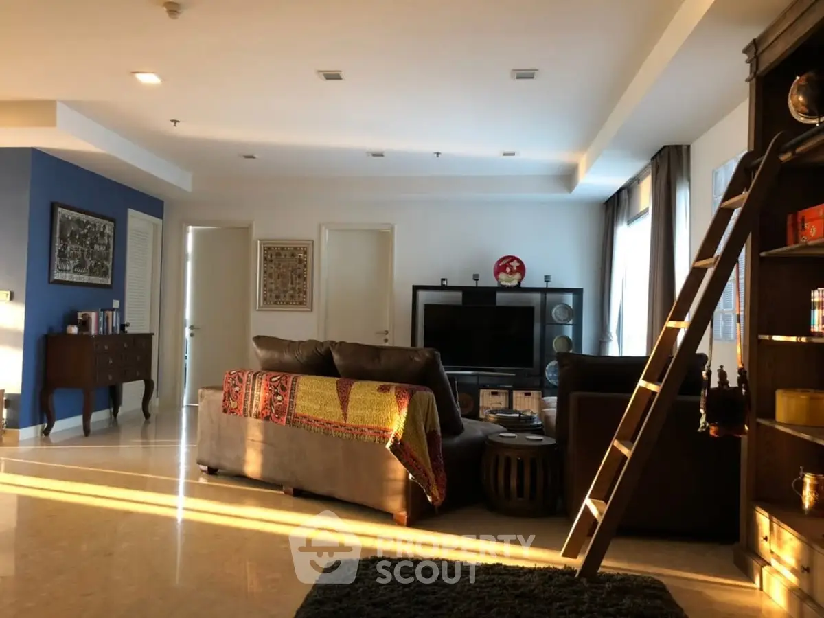 Spacious living room with cozy seating and modern decor