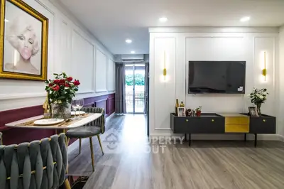 Stylish living room with modern decor and balcony view