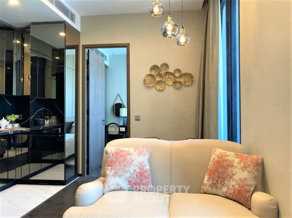Stylish living room with modern decor and elegant lighting in a luxury apartment.