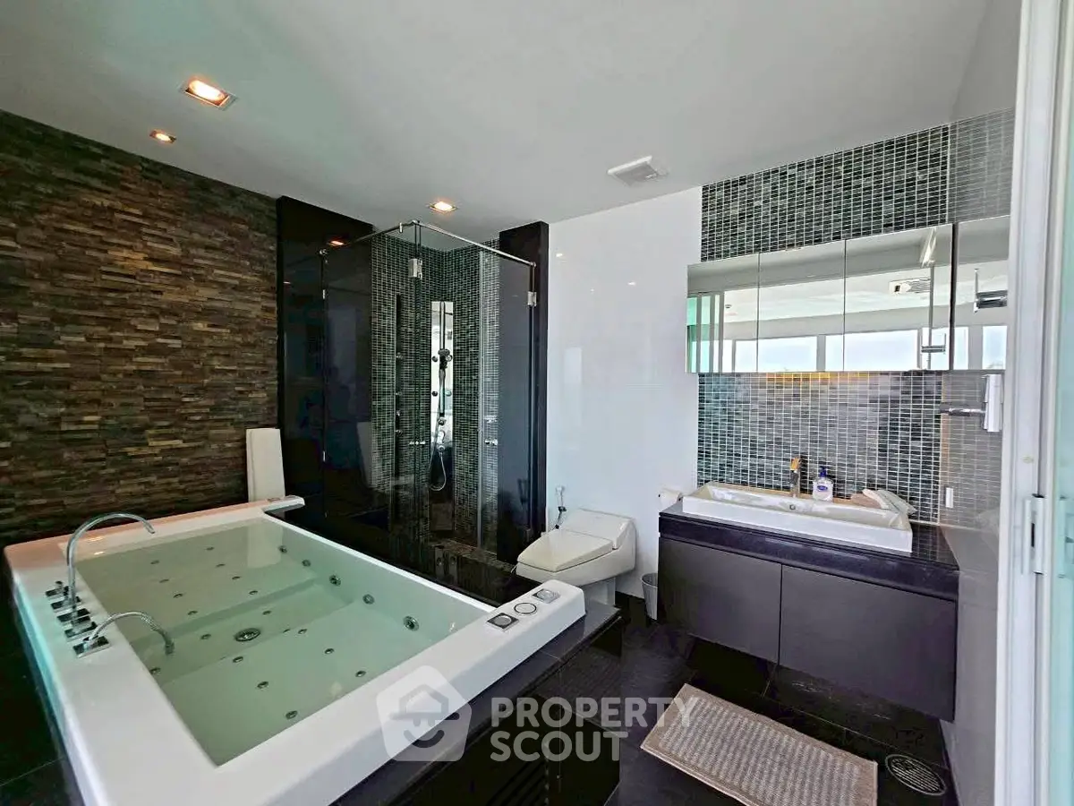 Luxurious modern bathroom with jacuzzi and sleek design