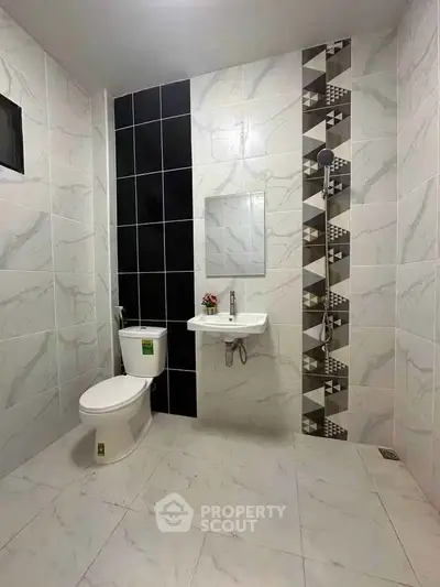 Modern bathroom with stylish tiles and sleek fixtures