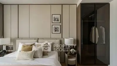 Luxurious bedroom with elegant decor and modern wardrobe in a stylish apartment.