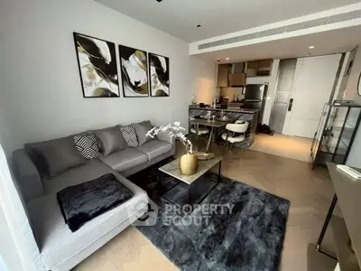 Modern living room with stylish decor and open kitchen layout