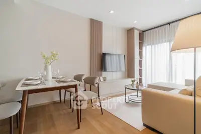 Modern living room with elegant dining area and stylish decor