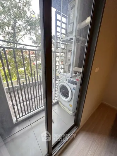 Modern balcony with washing machine and scenic view