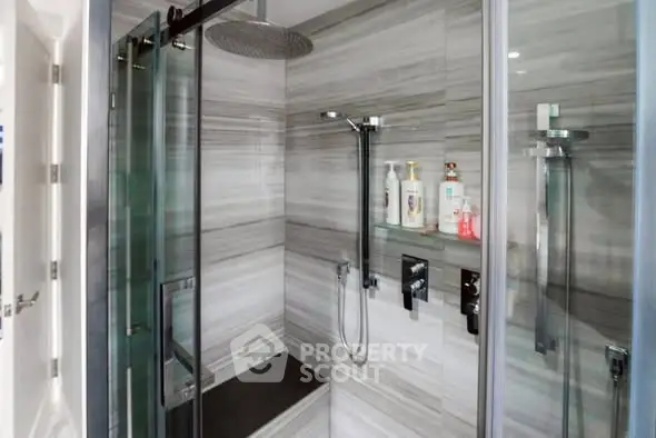 Modern bathroom with sleek shower design and elegant fixtures