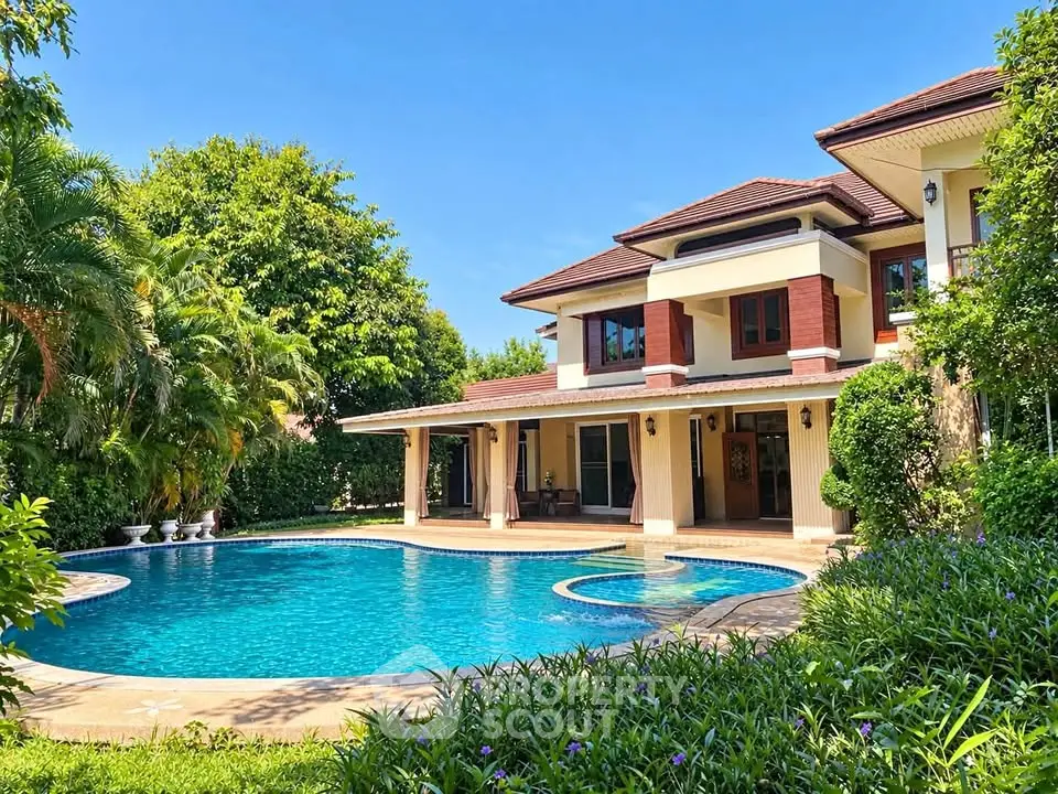 Luxurious villa with private pool and lush garden in serene setting