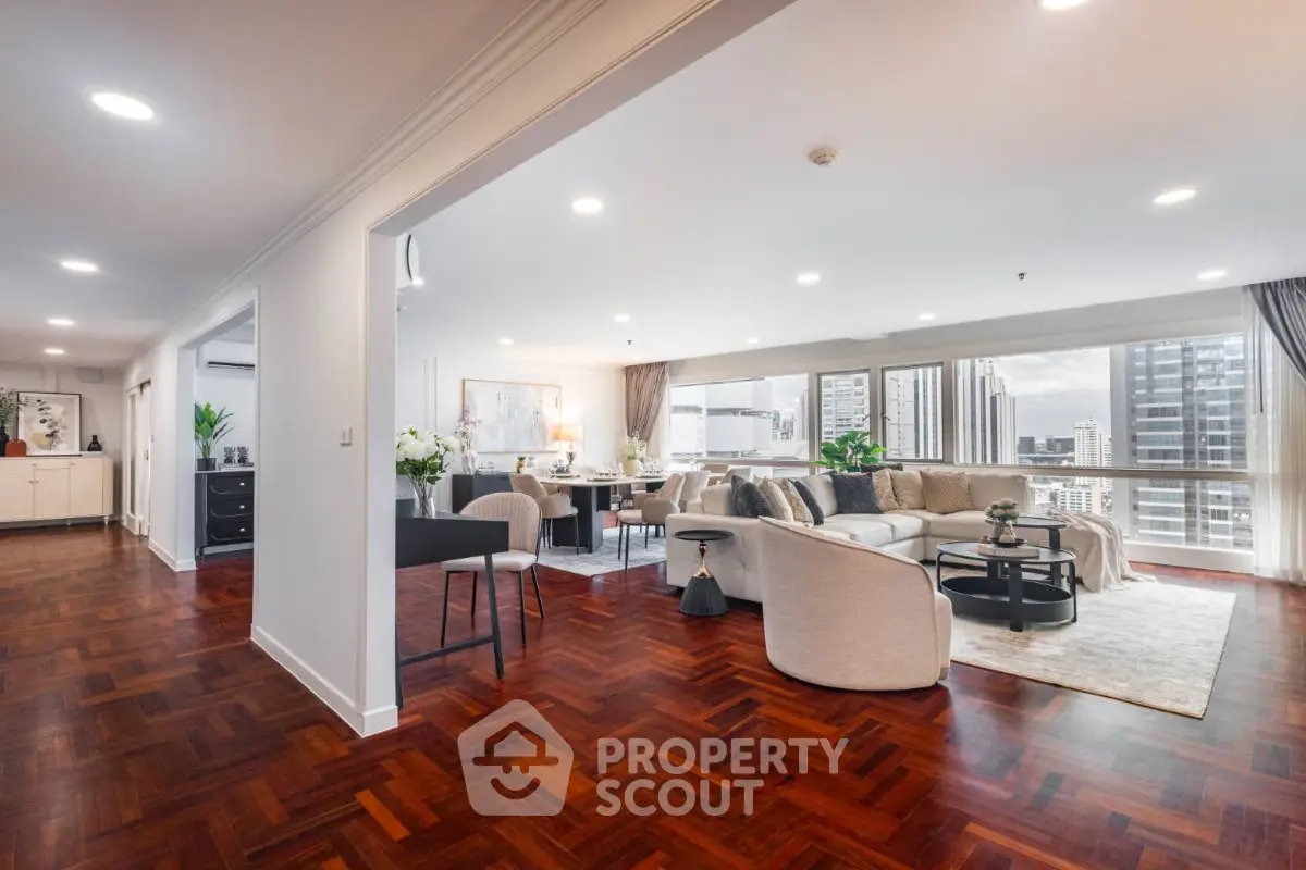 Spacious modern living room with city view and elegant decor
