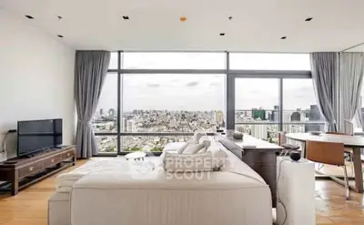 Luxurious living room with panoramic city view and elegant furnishings
