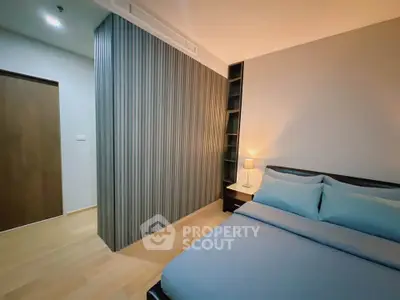 Modern bedroom with sleek design and ambient lighting