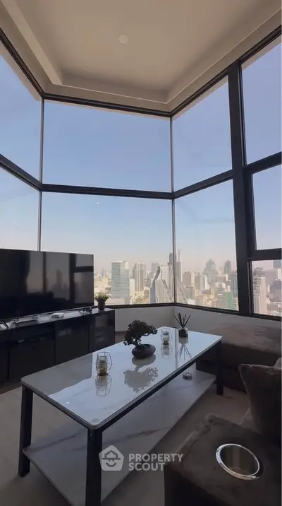 Luxurious living room with panoramic city views and modern decor