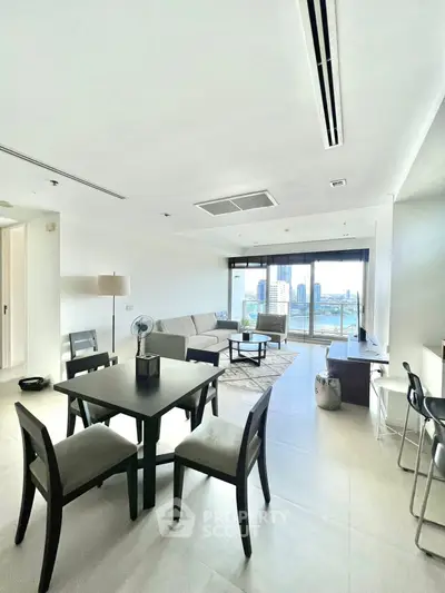 Spacious modern living room with city view and elegant dining area.