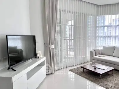 Elegant minimalist living room with large windows draped in sheer curtains, modern furniture, and a serene color palette.