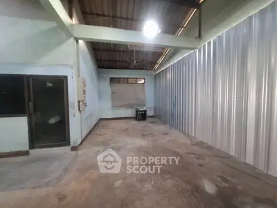 Spacious industrial-style storage unit with high ceilings and metal siding