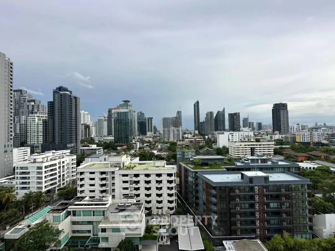 Stunning cityscape view showcasing modern high-rise buildings and lush greenery, perfect for urban living.