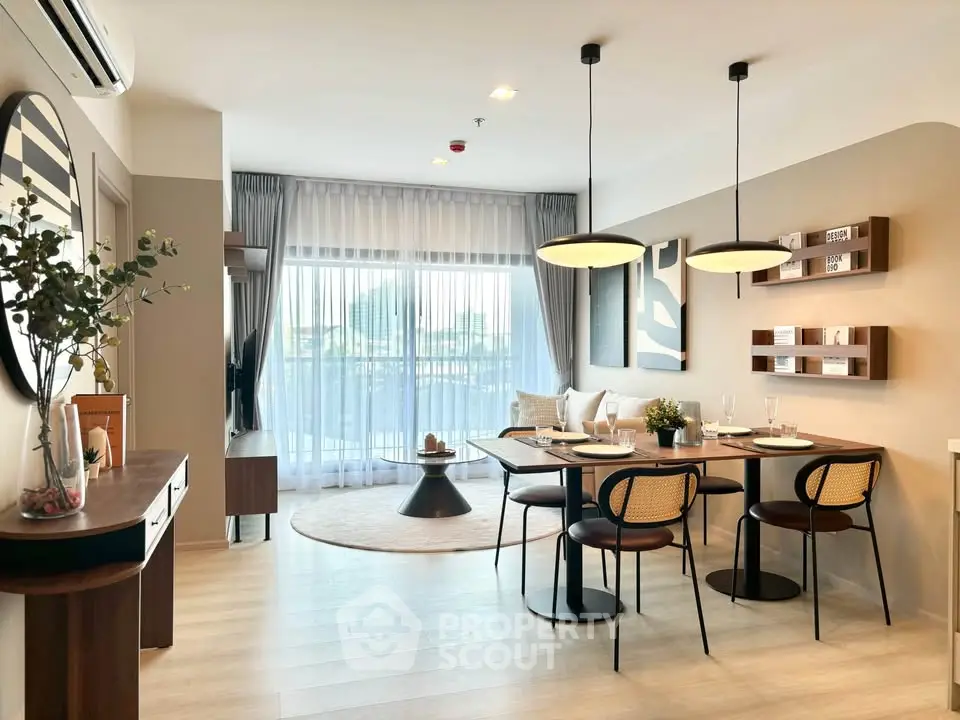 Modern living room with elegant dining area and large windows