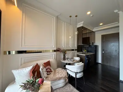 Stylish modern living room with elegant decor and compact kitchen area