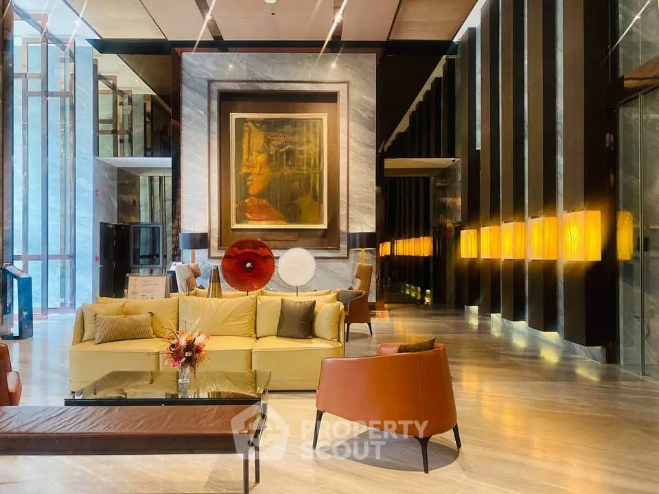 Luxurious modern lobby with elegant seating and artistic decor