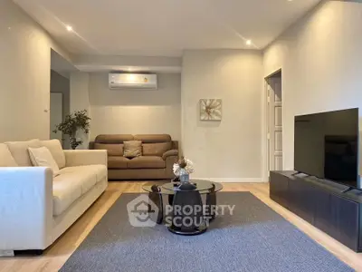 Modern living room with stylish furniture and air conditioning