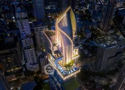 Stunning aerial view of a modern skyscraper with unique architectural design in a vibrant cityscape.