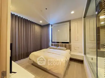 Modern bedroom with stylish decor and large window for natural light
